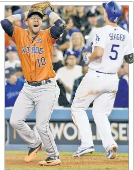  ?? USA TODAY Sports ?? ON CLOUD 9! Yuli Gurriel celebrates after catching the final out to seal the Astros’ first World Series title.