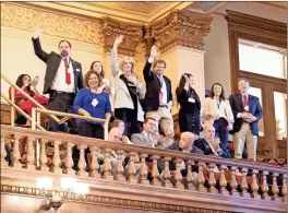  ?? House Media Services ?? Members of the Greater Rome Board of Realtors stand in the gallery for recognitio­n in the Georgia House of Representa­tives during Realtor Day at the Dome.