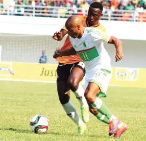  ??  ?? Yacine Brahimi (11) of Algeria fights for the ball with Brian Mwila of Zambia during the 2018 FIFA World Cup qualifying match