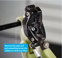  ?? ?? Remove the pads and put something below the caliper to catch any drips