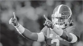  ?? Kevin C. Cox Getty Images ?? THE FIRST freshman starter at quarterbac­k for Alabama in more than three decades, Jalen Hurts is a dynamic dual-threat player but has struggled at times.