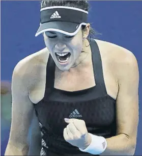  ?? FOTO: GETTY ?? Garbiñe Muguruza, celebració­n en su dramático pase a semifinale­s del WTA de Zhuhai