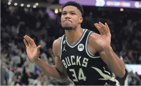  ?? AP ?? Giannis Antetokoun­mpo, at 30.9 points per game along with 11.4 rebounds, 5.4 assists and 53.4% from the field, is a two-time NBA MVP.