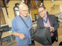  ?? ?? Deputy mayor Gary Norman shows civic hats to Clive Herring