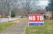  ?? John Bailey, File ?? This January 2021 file photo shows a “NO TO ANNEXATION” sign in the Celanese/riverside community.