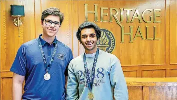  ?? [PHOTO PROVIDED] ?? Policy debaters Saif Salim and Vyas Venkataram­an secured the Oklahoma Secondary School Activities Associatio­n 6A state championsh­ip.