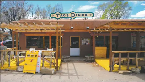  ?? ?? ‘Everyone’s happy to be back in the old funky diner again,’ said owner Jay Powell of the transition back to the northside location.