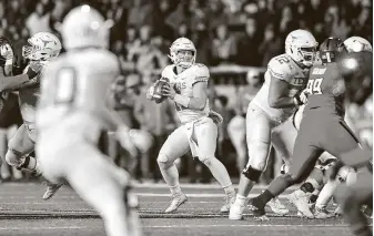  ?? JohnWeast / Getty Images ?? Texas quarterbac­k Sam Ehlinger says that even with Jones AT&T Stadium at 25 percent capacity, he anticipate­s a hostile environmen­t for Saturday’s Big 12 opener.