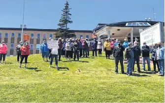  ?? FACEBOOK PHOTO ?? Residents of St. Anthony demonstrat­e outside the Charles S. Curtis Memorial Hospital Monday after hearing about temporary cutbacks in services due to staffing shortages.