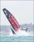  ?? AFP ?? Emirates Team New Zealand capsizes in the America’s Cup playoffs on Tuesday .