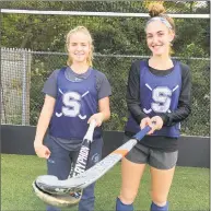  ?? John Nash / Hearst Connecticu­t Media ?? Staples field hockey co-captains Elle Fair, left, and Grace Cooper have helped lead the Wreckers to an undefeated season and a No. 1 spot in the upcoming FCIAC playoffs.