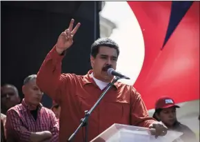  ?? RAYNER PENA/DPA/ABACA PRESS FILE PHOTOGRAPH ?? Nicolás Maduro, the president of Venezuela, meets with his followers in Caracas in February 2018.