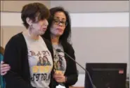  ?? ERIC BONZAR — THE MORNING JOURNAL ?? Elisa Maldonado, left, is consoled by Lizette Valdez as she reads a victim’s impact statement, March 5, 2018, during the sentencing of Matthew Glaze. Maldonado’s mother, 58-year-old Maria Maldonado, was fatally injured when the vehicle driven by Valdez...