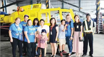  ??  ?? As part of SCCS’ Wishing Star project, volunteers arranged a helicopter ride for palliative patients.