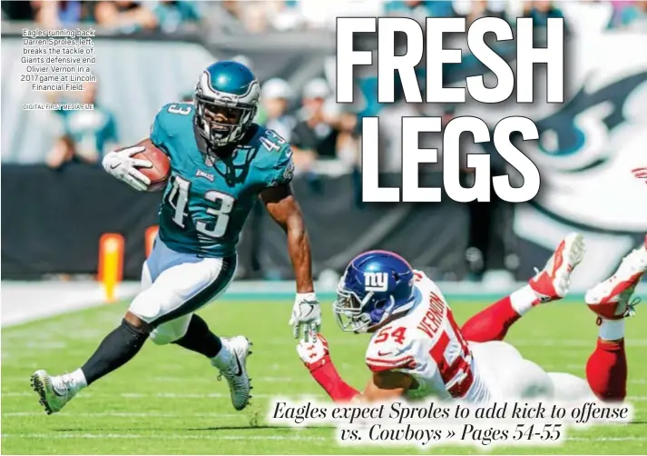  ?? DIGITAL FIRST MEDIA FILE ?? Eagles running back Darren Sproles, left, breaks the tackle of Giants defensive end Olivier Vernon in a 2017 game at Lincoln Financial Field.