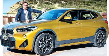  ??  ?? Lowrider: Ray with BMW’s X2 in the glitzy new shade of Galvanised Gold