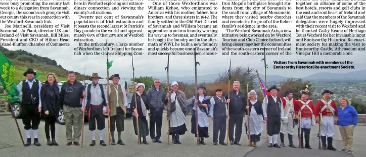  ??  ?? Visitors from Savannah with members of the Enniscorth­y Historical Re-enactment Society.