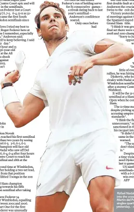  ?? – AFPPIX ?? Rafael Nadal throws a sweatband into the crowd after beating Juan Martin del Potro in their Wimbledon singles quarterfin­als match yesterday.