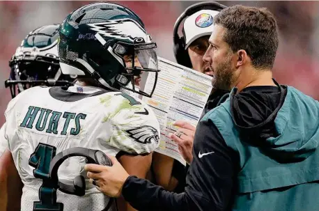  ?? David Maialetti/Tribune News Service ?? The Eagles’ decision to pivot from coach Doug Pederson and QB Carson Wentz to Nick Sirianni, right, and Jalen Hurts has paid off.