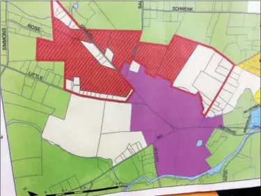  ?? EVAN BRANDT -- DIGITAL FIRST MEDIA ?? The striped areas show the five properties in the Goshenhopp­en Creek Overlay District, outlined in red, that are large enough to be eligible for increased housing density in exchange for sewer improvemen­ts.