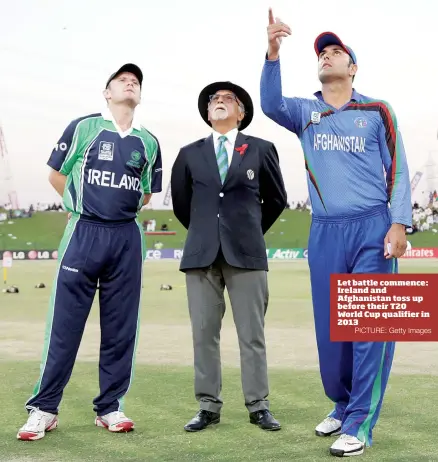  ?? PICTURE: Getty Images ?? Let battle commence: Ireland and Afghanista­n toss up before their T20 World Cup qualifier in 2013
