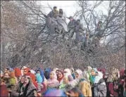  ?? REUTERS ?? Locals at the funeral of Yawar Wani, who was among two militants killed during an encounter with security forces in Zainapora area of Shopian district on Sunday. &gt;&gt; P10