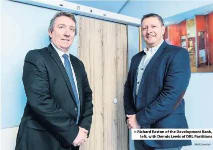  ?? Aled Llywelyn ?? &gt; Richard Easton of the Developmen­t Bank, left, with Dennis Lewis of DRL Partitions