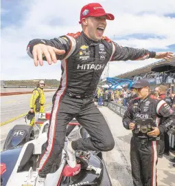  ?? DAVID ROYAL/AP ?? Josef Newgarden celebrates with his team after winning the IndyCar championsh­ip on Sunday in Monterey, Calif.
