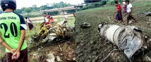  ??  ?? Photos show people looking at the wreckage of a crashed military plane at a field in Magway. — AFP photos