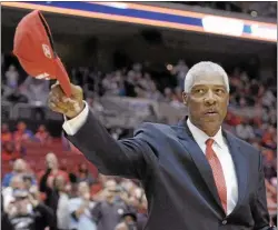  ?? MICHAEL PEREZ — THE ASSOCIATED PRESS ?? Hall of Famer Julius Erving tips his cap to the crowd at a game in 2013 celebratin­g the 30th anniversar­y of the Sixers’ 1982-83champion­ship team.