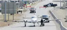  ?? LEAH HENNEL/POSTMEDIA FILES ?? A twin-engined aircraft made an emergency landing Apr. 25 on 36 St. N.E. in Calgary.
