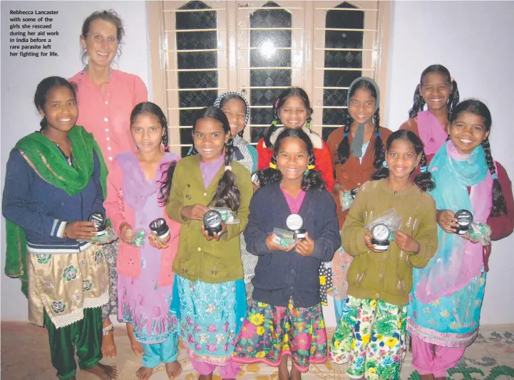  ??  ?? Rebhecca Lancaster with some of the girls she rescued during her aid work in India before a rare parasite left her fighting for life.