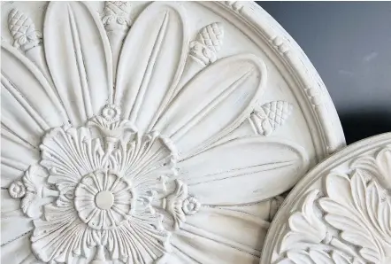  ?? — GETTY IMAGES FILES ?? Ceiling medallions made these days usually use rigid high-density urethane foam, while the PVC type can be flexible, so make sure to choose the right method to secure it in place.