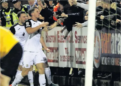  ?? Mike Petch ?? ●●Jimmy Ball celebrates his dramatic late equaliser for County at Boston on Saturday