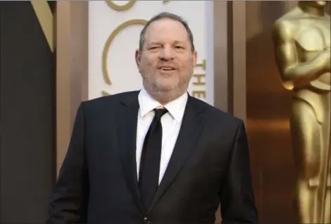  ?? PHOTO BY JORDAN STRAUSS — INVISION — AP, FILE ?? Harvey Weinstein arrives at the Oscars in Los Angeles. Even though the former Weinstein Co. co-chairman has been kicked out of the Academy of Motion Pictures Arts and Sciences and his company’s name has been erased from its best Oscar shot this year...