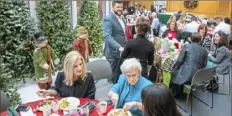  ??  ?? The Women of Joy Luncheon in the Wintergard­en room at West Penn Hospital.