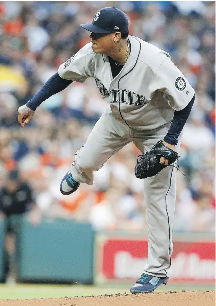  ?? — GETTY IMAGES ?? M’s ace Felix Hernandez seemed to be back to his old flame-throwing self, but not so fast. The 0.7mph average increase on his heaters is the result of a change in reporting velocity.