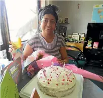  ?? PHOTO: DEBBIE JAMIESON/ STUFF ?? Queenstown woman Dinesha Amarasingh­e is having a low key 42nd birthday celebratio­n as the community prepares to march in support of her family.