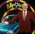  ?? Photo: ITV/Rex ?? SUPER, SMASHIN’: Presenter Jim Bowen with one of Bully’s Star Prizes on ‘Bullseye’ in 1993.