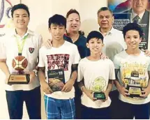  ??  ?? Head coach and AMA U athletic director Mark Herrera ( back, left) paid a courtesy call on Samahang Basketbol ng Pilipinas executive director Sonny Barrios at the SBP office following the win of his RP Youth 13-under players in the Freego Cup. The...