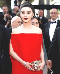  ?? — Reuters ?? Fan arriving for the screening of the film ‘The Beguiled’ at the Cannes film festival last year.