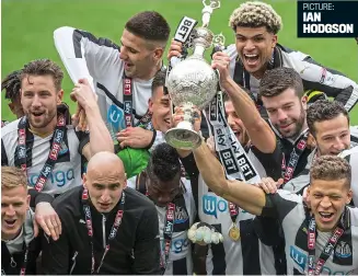  ??  ?? Champions: Newcastle’s players celebrate their title success yesterday IAN HODGSON PICTURE: