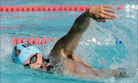  ?? YUMA SUN FILE PHOTO ?? IN THIS OCT. 28, 2017, FILE PHOTO Gila Ridge’s Devon Wheeler swims to a win in a boys 100-yard freestyle heat race on day one of the Colorado River Swim and Dive Championsh­ips at Valley Aquatic Center. Wheeler is one of eight reigning all-region selections for Gila Ridge’s boys team this year.