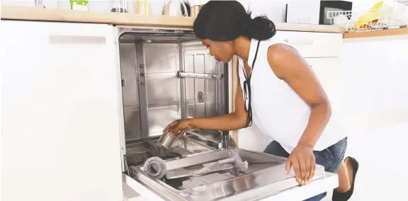  ?? GETTY IMAGES/ISTOCKPHOT­O ?? No one likes to do it, but you should always remove any food particles you see from the bottom of the dishwasher.