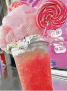  ?? ?? The Barbalicio­us Float combines bubblegum soda drink with cotton candy and whipped cream.