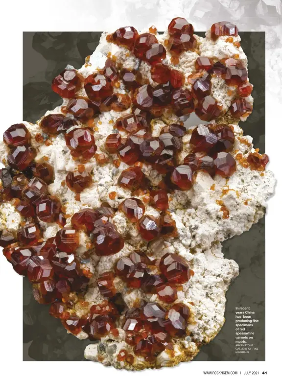  ?? ARKENSTONE GALLERY OF FINE MINERALS ?? In recent years China has been producing fine specimens of red spessartin­e garnets on matrix.