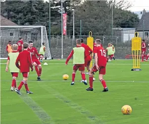  ??  ?? The next generation: Youngsters get to grips with one of the new training pitches