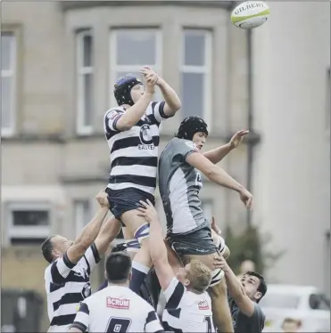  ?? Picture: Andrew O’brien ?? Heriot’s and Hawick, who scored nine tries between them, vie for the ball at a line–out