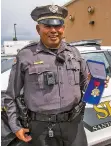  ?? SAMI EDGE/THE NEW MEXICAN ?? Santa Fe County Sheriff’s Deputy Joe Vigil holds a Medal of Valor award given to him earlier this year by Santa Fe Crime Stoppers.