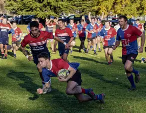  ?? PHOTO: RICHARD JONES ?? Sealing victory . . . Maniototo winger Harry Connor scores a late winning try in Cromwell on Saturday.